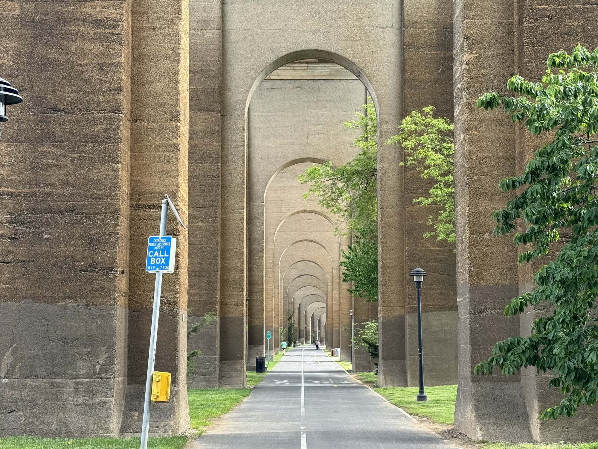 Nice long-ish bike path under the bridge with dramatic archways